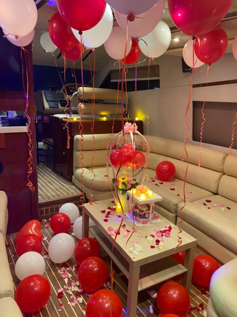 Interior birthday decoration with red and white balloons