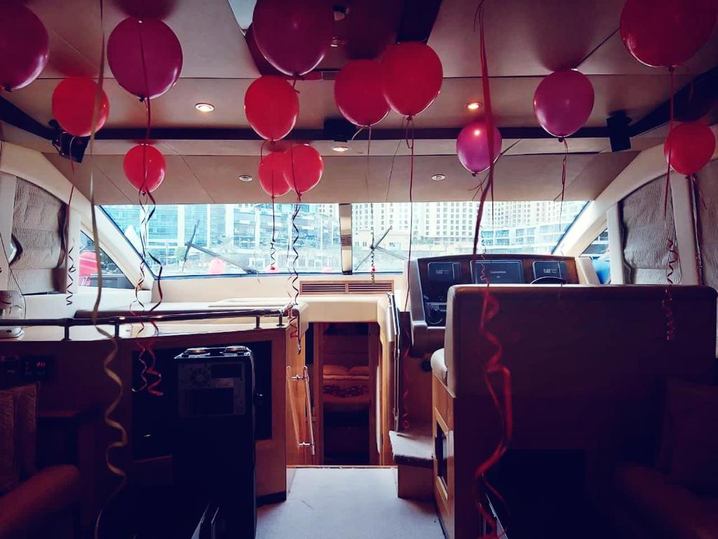 Red Special Birthday Balloons Decoration on yacht
