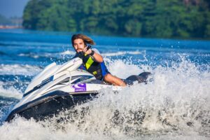 Customer on Jet Ski Ride with Mi Yachts